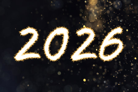Happy New Year card. Sparkling numbers 2026 against black background, bokeh lightsの写真素材