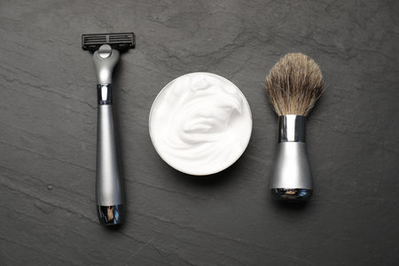 Different barber's tools on black background, flat layの写真素材