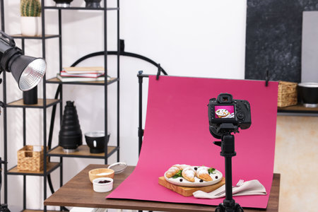 Shooting tasty croissants with camera in studio. Professional food photographyの写真素材