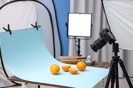 Shooting fresh oranges with camera in studio. Professional food photographyの写真素材