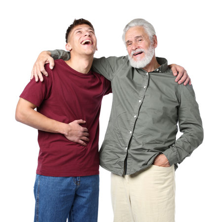 Father and son hugging on white backgroundの写真素材