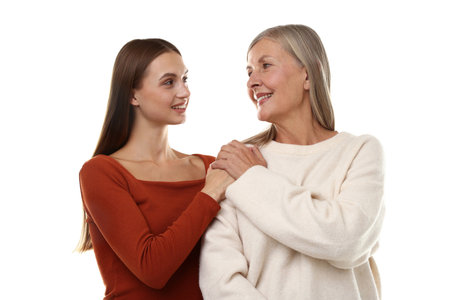 Mother and daughter on white background. Family bondingの写真素材