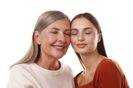Mother and daughter on white background. Family bonding