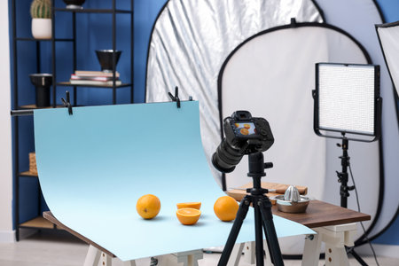 Shooting fresh oranges with camera in studio. Professional food photographyの写真素材