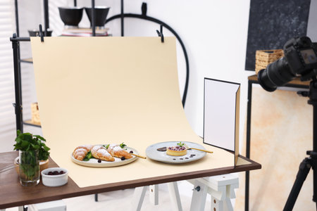 Shooting tasty pastries with camera in studio. Professional food photographyの写真素材