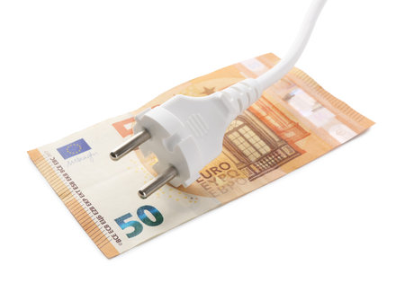 Electrical wire with plug and banknote isolated on white