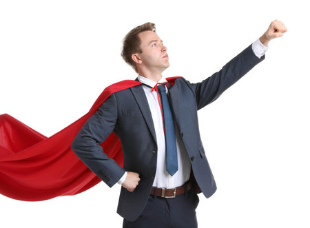 Businessman wearing superhero cape on white backgroundの写真素材