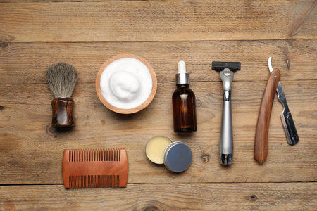 Different barber's tools on wooden background, flat layの写真素材