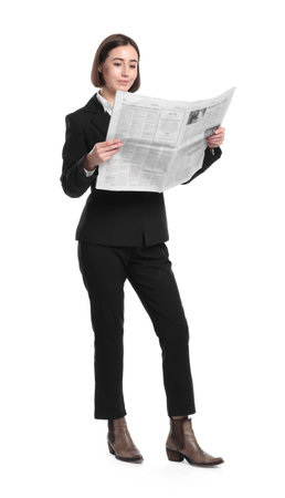 Woman in suit reading newspaper on white backgroundの写真素材