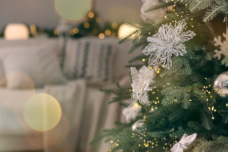 Christmas tree and bokeh lights on greeting card. Festive designの写真素材