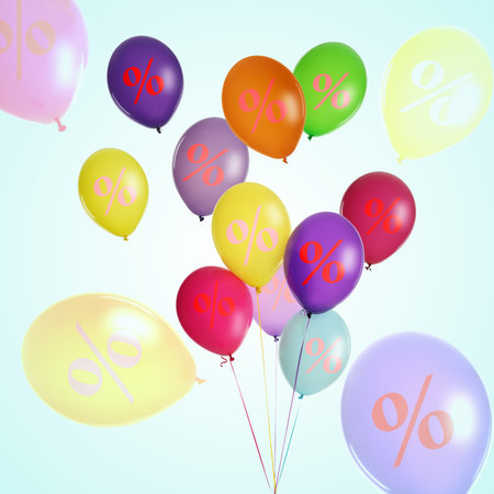 Colorful balloons with percent signs on white backgroundの写真素材