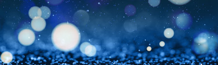 Christmas background with blue glitters and bokeh lights. Banner designの写真素材