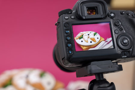 Shooting tasty croissants with camera in studio, selective focus. Professional food photographyの写真素材