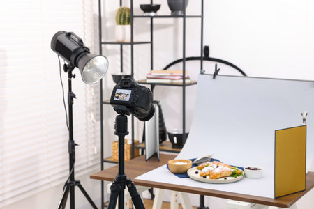 Shooting tasty croissants and ingredients with camera in studio. Professional food photographyの写真素材