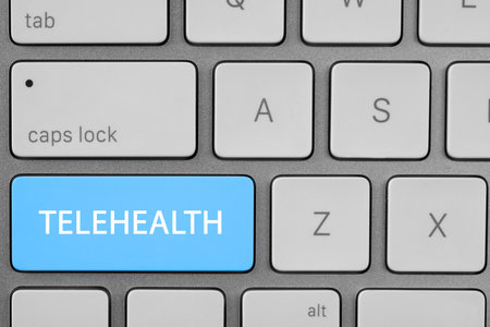 Button with word Telehealth on computer keyboard, closeupの写真素材