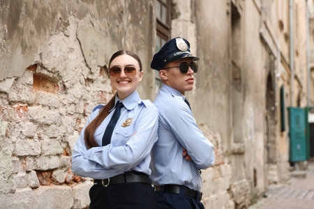 Portrait of police officers on city streetの写真素材
