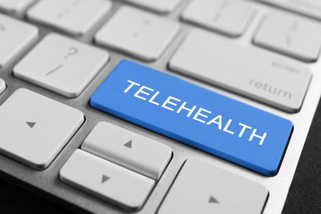 Blue button with word Telehealth on computer keyboard, closeupの写真素材