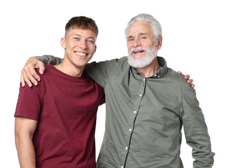 Father and son hugging on white backgroundの写真素材
