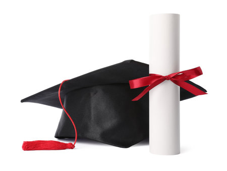 Graduation cap and diploma isolated on whiteの写真素材