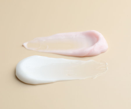 Samples of different cosmetic products on beige background, closeupの写真素材