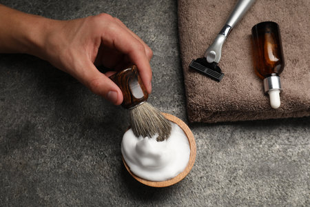 Barber with tools at gray table, closeupの写真素材