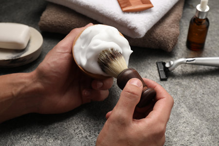 Barber with tools at gray table, closeupの写真素材