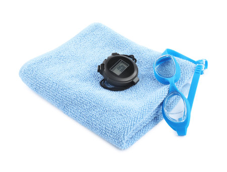 Blue towel, goggles and digital stopwatch isolated on white. Swimming toolsの写真素材
