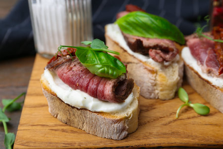 Bruschettas with roast beef served on table, closeupの写真素材