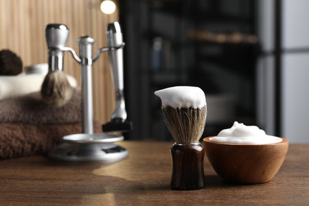Barber's tools on wooden table in barbershop, closeupの写真素材