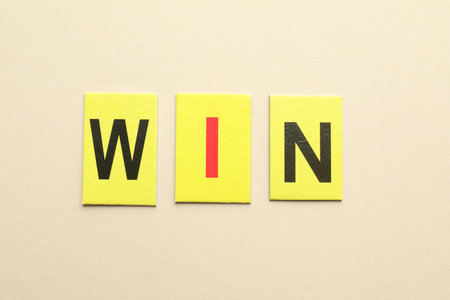Cards with word Win on beige background, flat layの写真素材