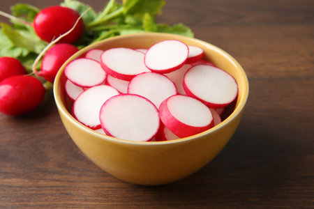 Fresh ripe radishes on wooden table, closeupの写真素材