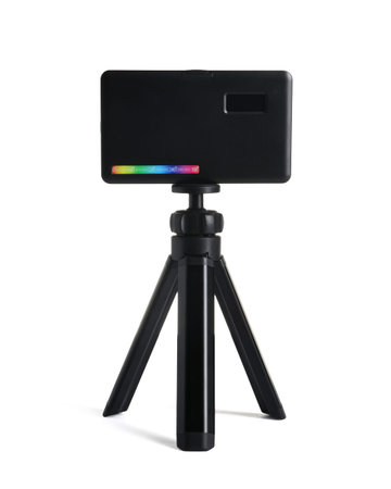 Stylish lamp on tripod isolated on whiteの写真素材