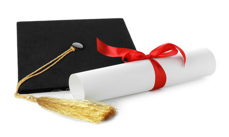 Diploma and graduation hat isolated on whiteの写真素材