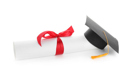 Diploma and graduation hat isolated on whiteの写真素材