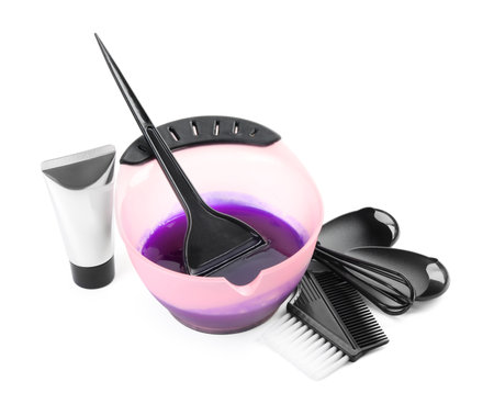 Different tools and products for hair dyeing isolated on whiteの写真素材