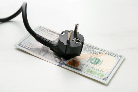 Electrical wire with plug on white table, closeupの写真素材