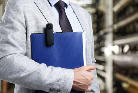 Businessman near building indoors, closeupの写真素材