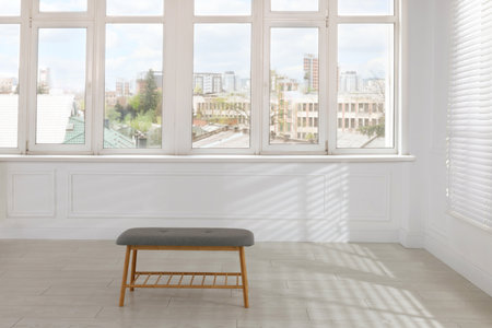 Bench in spacious room with window. Interior designの写真素材