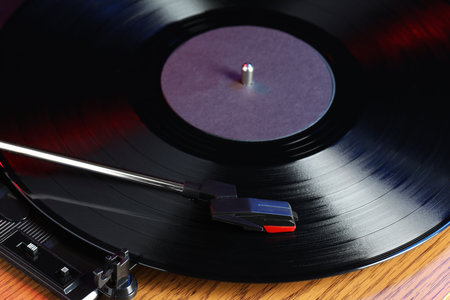 Closeup view of turntable with vinyl record