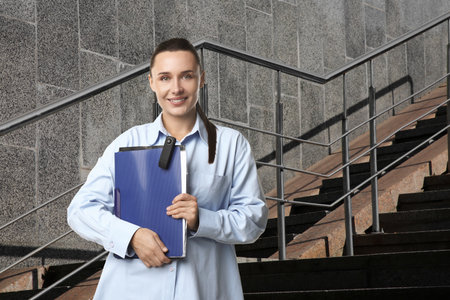 Woman outdoors near buildingの写真素材