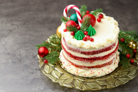 Tasty cake with Christmas decor on gray table, closeup. Space for textの写真素材
