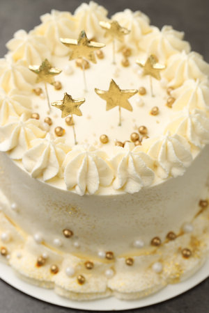Delicious cake with Christmas decor on gray table, closeupの写真素材