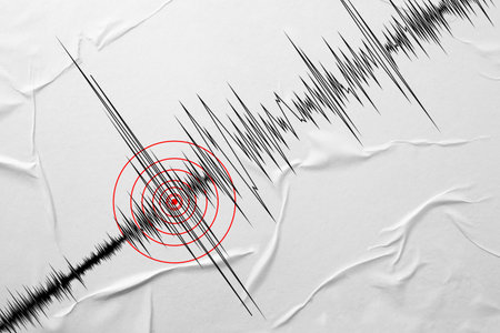 Earthquake marked with red circles on seismogram. Graph from seismometerの写真素材