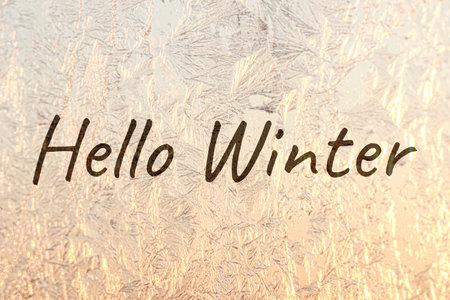 Hello winter card with text on frosty windowの写真素材