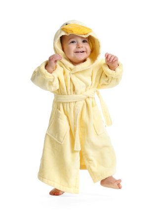 Cute baby in bathrobe on white backgroundの写真素材