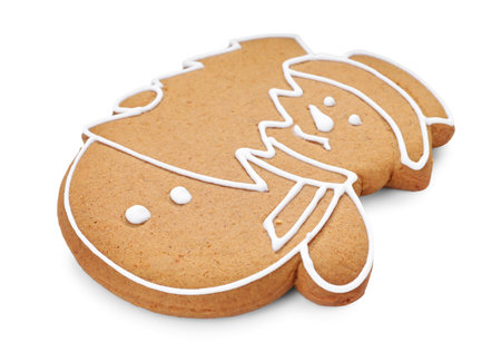 Tasty gingerbread cookie in shape of snowman isolated on white. Christmas treatの写真素材
