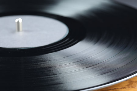 Closeup view of turntable with vinyl recordの写真素材