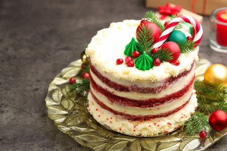 Tasty cake with Christmas decor on gray table, closeup. Space for textの写真素材