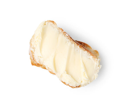 Slice of baguette with butter isolated on white, top view