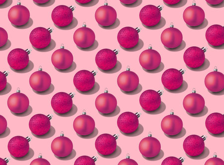 Christmas balls on pink background. Pattern designの写真素材